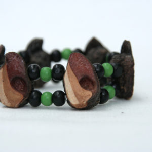 Double-stranded beaded bracelet with green and black beads using elastic