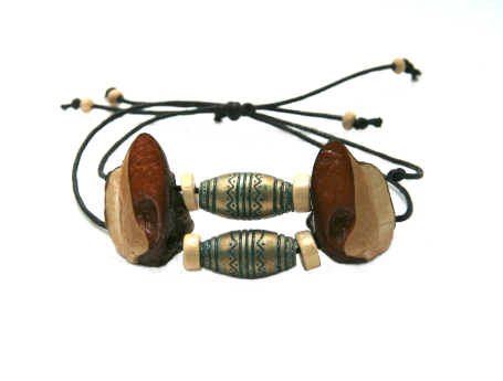 Sliding bracelet, handmade beads, creme disc beads in black, double-stranded waxed cord