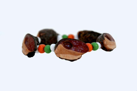 single strand elastic bracelet in green, orange and white
